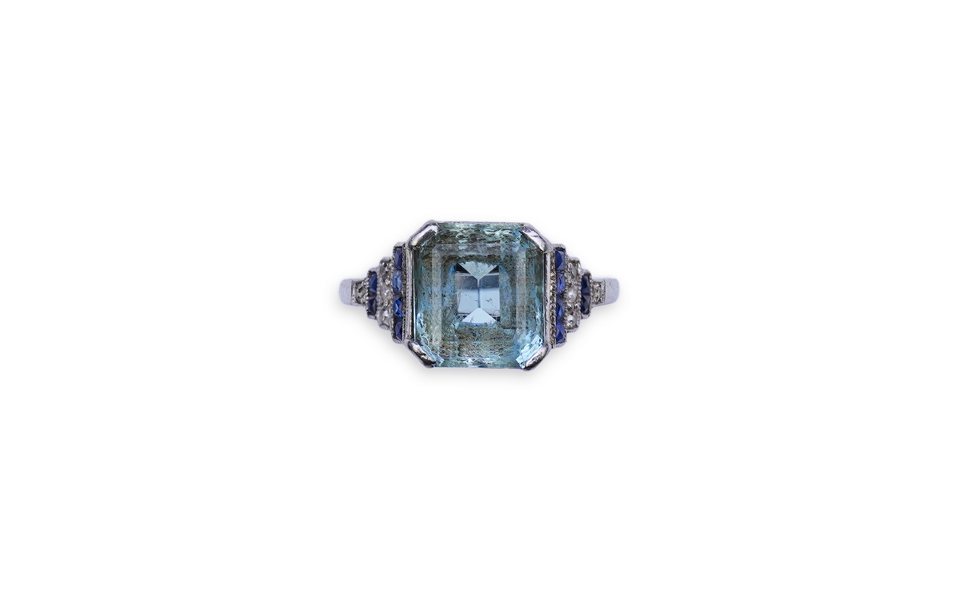 An aquamarine, sapphire and diamond ring